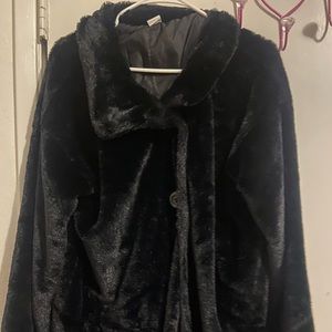 Black soft furry light over coat